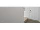 Bright entryway with a solid white front door and stairs with carpet at 433 Citron St, Sanford, NC 27332