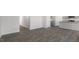 Open-concept living room with luxury vinyl plank flooring, neutral walls, and lots of natural light at 433 Citron St, Sanford, NC 27332