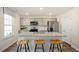 Kitchen with granite island, stainless appliances, and seating at 437 Citron St, Sanford, NC 27332