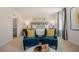 Bright main bedroom features natural light, decor pillows, modern art, and neutral colors at 437 Citron St, Sanford, NC 27332