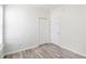 A bright bedroom includes two closets and a large window at 4913 Sugargrove Ct, Apex, NC 27539