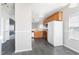 Bright kitchen featuring wood cabinets, modern appliances, and tile flooring at 4913 Sugargrove Ct, Apex, NC 27539