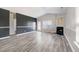 A living room featuring a fireplace, high ceilings, wood floors and natural light at 4913 Sugargrove Ct, Apex, NC 27539