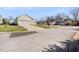 Street view of this home showing the garage, driveway and front yard at 4913 Sugargrove Ct, Apex, NC 27539
