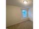 A comfy bedroom with a window allowing for natural light at 544 John Stark Dr, Fuquay Varina, NC 27526
