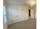 A spacious bedroom is equipped with a closet for extra storage at 544 John Stark Dr, Fuquay Varina, NC 27526