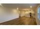 Spacious living area adjacent to the kitchen area, featuring hardwood floors and abundant natural light at 544 John Stark Dr, Fuquay Varina, NC 27526
