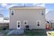 View of back exterior features, with a grill and outdoor play set at 5627 Quitman Trl, Raleigh, NC 27610