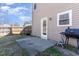 Backyard featuring a patio and a grill, ideal for outdoor gatherings and relaxation at 5627 Quitman Trl, Raleigh, NC 27610