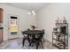 Cozy eat-in kitchen with a view to the backyard and a breakfast area at 5627 Quitman Trl, Raleigh, NC 27610