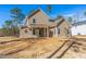 Exterior backyard view of the home at 6935 Old Jefferson Hwy, Cameron, NC 28326