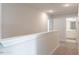 Upstairs hallway features plush carpeting, recessed lighting, and access to an upstairs bathroom at 6935 Old Jefferson Hwy, Cameron, NC 28326