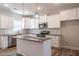 Bright kitchen features granite countertops, stainless steel appliances, and a large island at 6935 Old Jefferson Hwy, Cameron, NC 28326