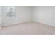 A bright bedroom with soft carpeting, a window with blinds and neutral walls, creating a peaceful atmosphere at 864 Forth Ct # 150, Gibsonville, NC 27249