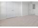 Spacious bedroom featuring soft carpeting, a large closet, and multiple entryways at 864 Forth Ct # 150, Gibsonville, NC 27249