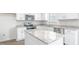 Bright kitchen features granite countertops, white cabinets, and stainless steel appliances at 864 Forth Ct # 150, Gibsonville, NC 27249