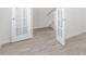 Bright room with sleek floor, glass doors and an open view at 864 Forth Ct # 150, Gibsonville, NC 27249