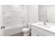 A well-lit bathroom featuring a shower and tub combo, toilet, and a vanity with a sink at 865 Forth Ct # 145, Gibsonville, NC 27249