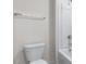Bathroom featuring a toilet, towel bar, and walk-in shower with glass door at 872 Forth Ct # 149, Gibsonville, NC 27249
