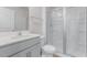 Modern bathroom featuring a glass-enclosed shower and granite vanity at 872 Forth Ct # 149, Gibsonville, NC 27249