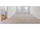 Expansive carpeted bedroom featuring two windows that provide plenty of light at 872 Forth Ct # 149, Gibsonville, NC 27249