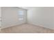 Bedroom with neutral carpet, bright window, and ample electrical outlets at 872 Forth Ct # 149, Gibsonville, NC 27249