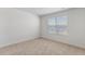 Bedroom with neutral carpet, bright window, and ample electrical outlets at 872 Forth Ct # 149, Gibsonville, NC 27249