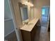 Bathroom features dual sinks, white countertops, and a mirror at 88 E Victory View Ter, Smithfield, NC 27577