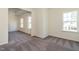 Spacious bedroom with neutral walls, carpet flooring, and bright windows with natural light at 88 E Victory View Ter, Smithfield, NC 27577