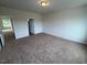 A carpeted bedroom featuring neutral walls, providing a blank canvas for personalization at 88 E Victory View Ter, Smithfield, NC 27577