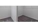 Walk-in closet with carpet flooring, and wire shelving for optimal organization at 88 E Victory View Ter, Smithfield, NC 27577
