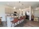 Modern kitchen featuring a large island with barstool seating and stainless steel appliances at 88 E Victory View Ter, Smithfield, NC 27577