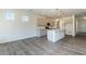 Open-concept kitchen featuring stainless appliances, granite countertops, and a center island with pendant lighting at 88 E Victory View Ter, Smithfield, NC 27577