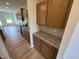 Kitchen featuring granite countertops and wood cabinets with stainless appliances at 88 E Victory View Ter, Smithfield, NC 27577