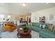 Open-concept living area with a modern kitchen, dining area, and comfortable seating at 88 E Victory View Ter, Smithfield, NC 27577