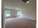 This living room features neutral carpet and natural light from dual windows at 88 E Victory View Ter, Smithfield, NC 27577