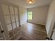 Cozy office space featuring wood flooring and a window with natural light at 88 E Victory View Ter, Smithfield, NC 27577
