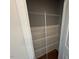Pantry features wire shelving and neutral carpeted flooring at 88 E Victory View Ter, Smithfield, NC 27577