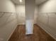 Spacious walk-in closet with ample shelving for organized storage at 88 E Victory View Ter, Smithfield, NC 27577
