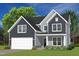Stylish two-story home with a two-car garage and inviting front porch at 0 Old Middlesex Rd Rd, Middlesex, NC 27557