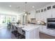 Modern kitchen with a large island, stainless steel appliances, and custom cabinetry at 0 Old Middlesex Rd Rd, Middlesex, NC 27557
