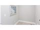 Utility laundry room area with a tile floor and wall decor at 0 Old Middlesex Rd Rd, Middlesex, NC 27557
