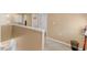 Second floor hallway with carpet flooring and neutral walls leads to a linen closet and bedrooms at 1004 Bridgewater Dr, Durham, NC 27704