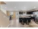 Open kitchen offers modern appliances, a breakfast bar, and a seamless connection to the living and dining spaces at 1004 Bridgewater Dr, Durham, NC 27704