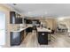 Open kitchen offers modern appliances, a breakfast bar, and is brightly lit with recessed lighting at 1004 Bridgewater Dr, Durham, NC 27704