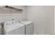 Bright laundry area with a full size washer and dryer at 1004 Bridgewater Dr, Durham, NC 27704