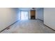 Bright living room featuring a fireplace and sliding glass doors to the outside at 1004 Hempstede Dr, Zebulon, NC 27597