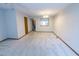 Spacious living room with neutral carpet and lots of natural light at 1004 Hempstede Dr, Zebulon, NC 27597