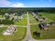 Aerial view of the community showcasing well-maintained lawns and landscaping, set in a peaceful neighborhood at 105 Pinecrest Dr, Angier, NC 27501
