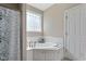 Corner soaking tub with tile surround and privacy window at 105 Pinecrest Dr, Angier, NC 27501